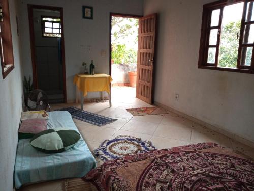 Postel nebo postele na pokoji v ubytování Espaço Crisântemos Búzios