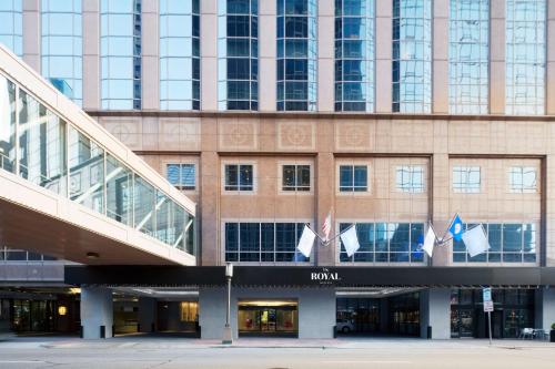 a large building with flags in front of it at The Royal Sonesta Minneapolis Downtown in Minneapolis