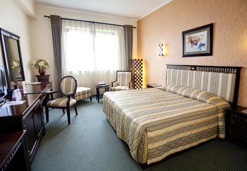 Giường trong phòng chung tại Hotel Tecadra