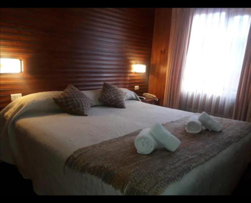 Cama o camas de una habitación en Hotel Casa Kolping