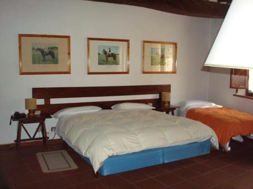 Postel nebo postele na pokoji v ubytování Albergo La Sfinge