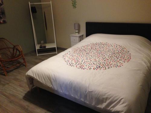 Cama ou camas em um quarto em Appartements d'hôtes Santa Giulia