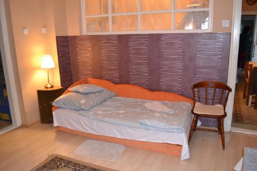 Una cama o camas en una habitación de Vár-lak Vendégház