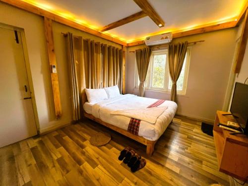 Postel nebo postele na pokoji v ubytování Silu Homes by Hostmandu