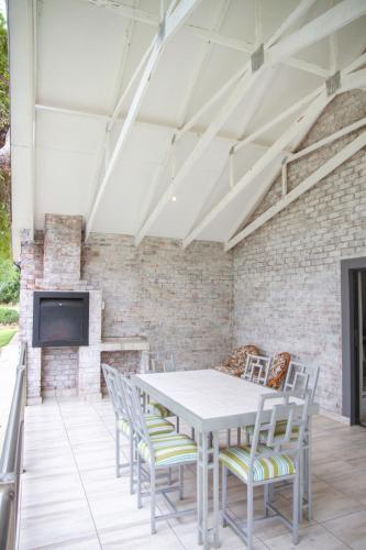 Patio nebo venkovní prostory v ubytování Klippan River Lodge