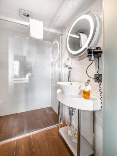 a bathroom with a sink and a shower at Misa Hotel in Istanbul