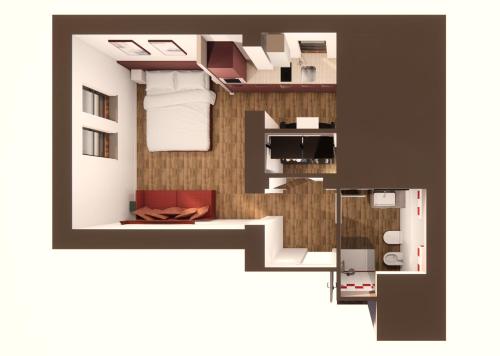 plan piętra małego apartamentu z sypialnią w obiekcie Monolocale Ninetta Dolomiti bellunesi w mieście Belluno