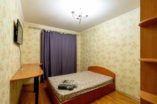 Postel nebo postele na pokoji v ubytování Kvartirkoff na Levka Lukyanenko 3v