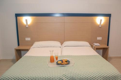 Katil atau katil-katil dalam bilik di Hotel Apartamentos Pyr Fuengirola