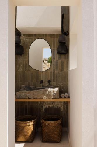 a bathroom with a sink and a mirror at Tenuta Negroamaro in Gallipoli