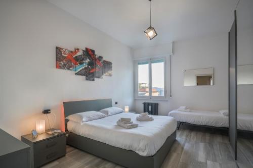 Llit o llits en una habitació de Brizio's Flat - Sweet Dreams in Florence