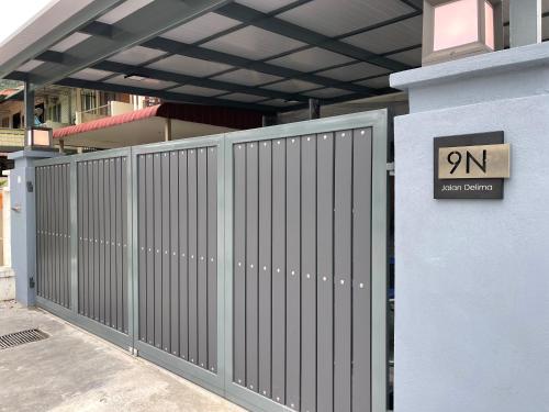 a metal fence on the side of a building at -NEW- 16Px V Kids Pool n KTV n Jacuzzi n Billiard near USM n Penang Bridge in George Town