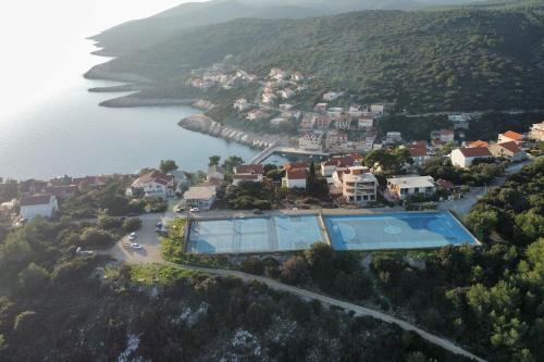 an aerial view of a resort with a swimming pool at SEAWAY in Zavalatica