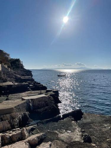a large body of water with the sun in the sky at SEAWAY in Zavalatica