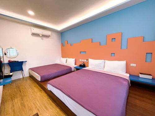 Una cama o camas en una habitación de Nian Nian Bungalow