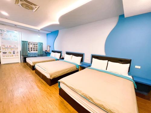Una cama o camas en una habitación de Nian Nian Bungalow