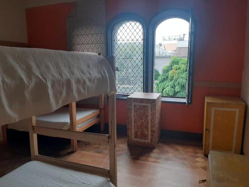 Postel nebo postele na pokoji v ubytování Landay Hostel