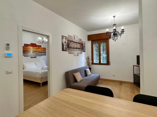 A bed or beds in a room at Eclectic Space Padova two apartments