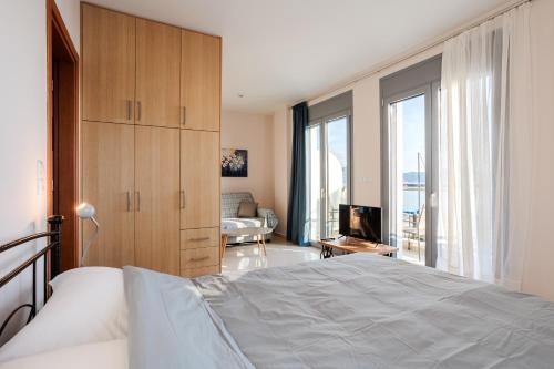 Posteľ alebo postele v izbe v ubytovaní Georgia seaview apartments Α2
