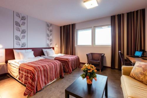 Кровать или кровати в номере Hotel Salora