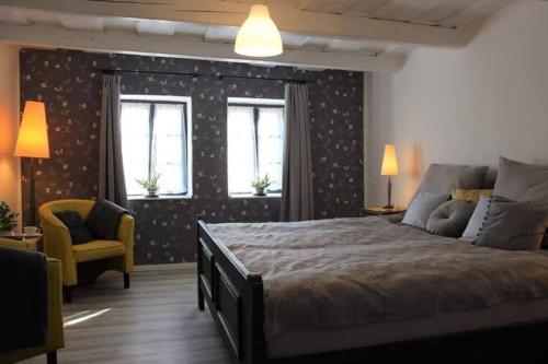 Postel nebo postele na pokoji v ubytování Kismadár Vendégház Noszvaj