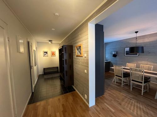 a hallway leading to a living room and dining room at Funäs Fjällby Funäsdalen in Funäsdalen