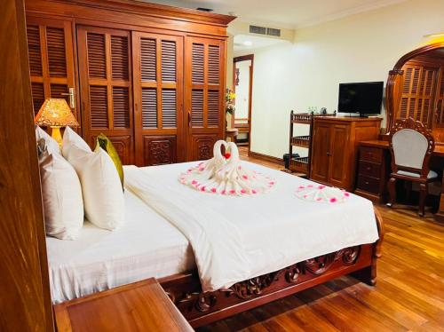 Katil atau katil-katil dalam bilik di Dragon Royal Angkor Hotel