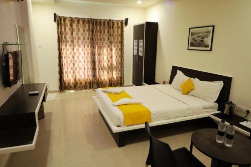 Hotel Sai Bansiにあるベッド