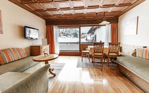 TV a/nebo společenská místnost v ubytování Appartements Eldorado