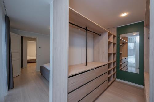 a room with a closet with a bed in it at Kalda Villa in Kitseküla