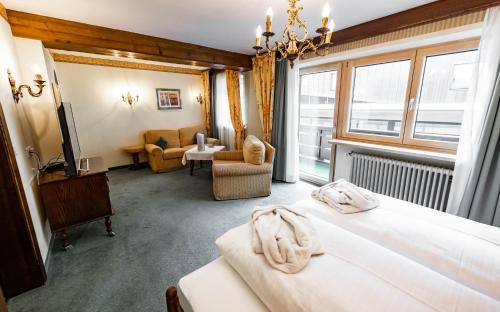 Postel nebo postele na pokoji v ubytování Hotel Olympia