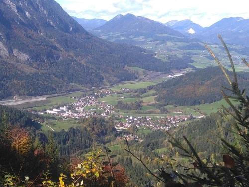 a town in a valley with mountains in the background at Familienbauernhof Imitz, Ferienwohnung in Spital am Pyhrn