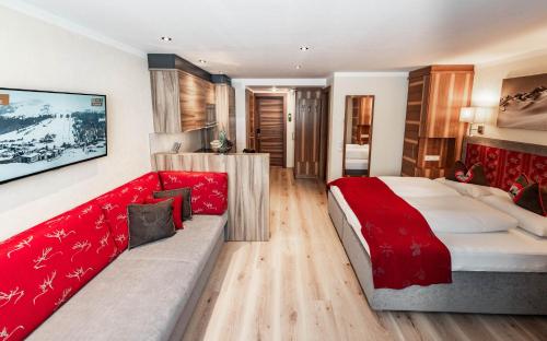 Postel nebo postele na pokoji v ubytování Appartements Eldorado