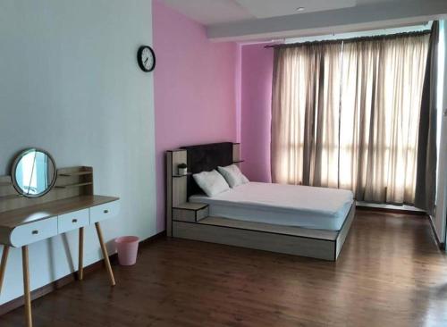 a bedroom with a bed and a window with a mirror at Romance in de house 3-5pax Two Parking Free, There is a shopping mall downstairs in Kuala Lumpur