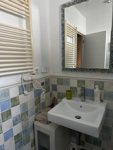 Ένα μπάνιο στο Cristina Apartamento Center