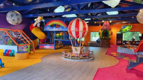 a room with many different types of play equipment at Santíssimo Resort in Tiradentes