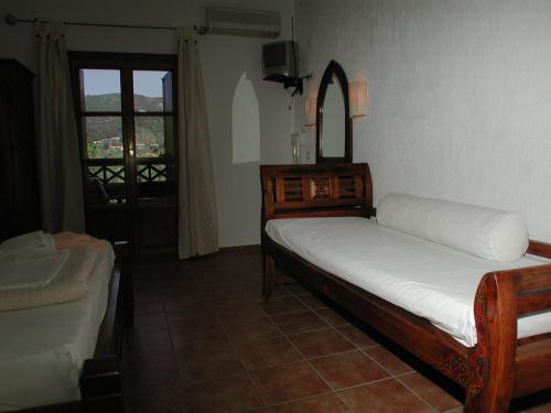 Postel nebo postele na pokoji v ubytování Sun Accommodation