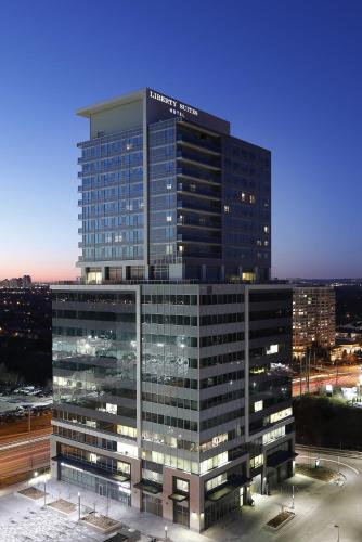 a tall building with a lot of windows at Liberty Suites in Thornhill