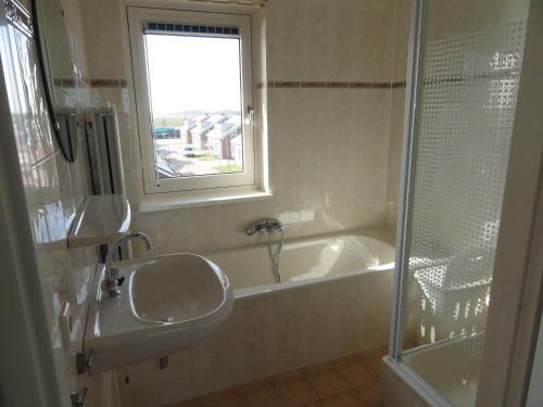 Bilik mandi di Appartement Uniekappart