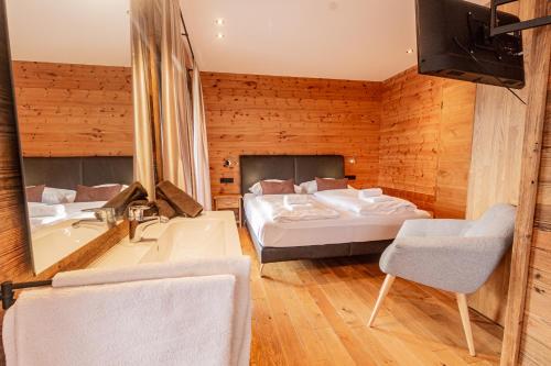 A bed or beds in a room at Chalet Dinkel in Niedernsill