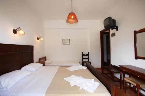 Postel nebo postele na pokoji v ubytování Sun Accommodation