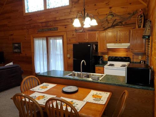 Story Brook: Beautiful true log cabin! Close to Dollywood, State Park, and more! photo 13
