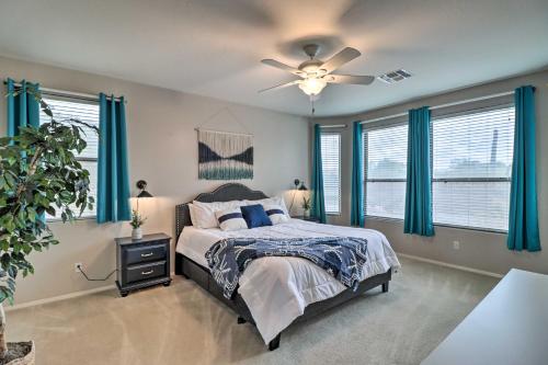 a bedroom with a bed and a ceiling fan at Gold Canyon House with Superstition Mountain Views! in Gold Canyon