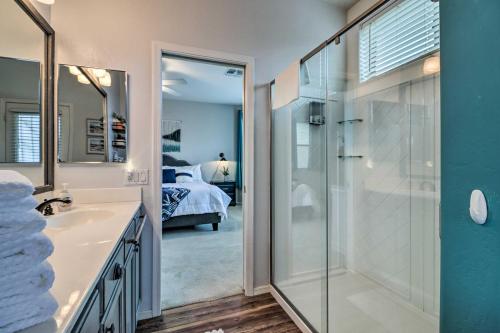 a bathroom with a glass shower and a sink at Gold Canyon House with Superstition Mountain Views! in Gold Canyon