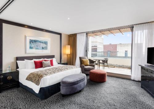 Postel nebo postele na pokoji v ubytování Crowne Plaza Auckland by IHG