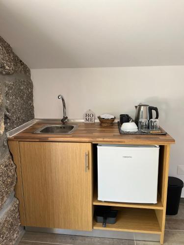 Η κουζίνα ή μικρή κουζίνα στο Casas do Monte