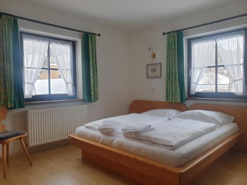 Llit o llits en una habitació de Appartement Schwaighofwirt