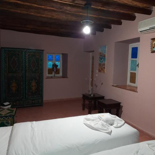 Katil atau katil-katil dalam bilik di Gîte Rural de Marrakech