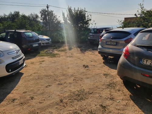 a bunch of cars parked in a parking lot at Residence l'Incanto in Piano di Sorrento