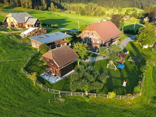 an overhead view of a large house with a yard at Nagerhof in Gnesau